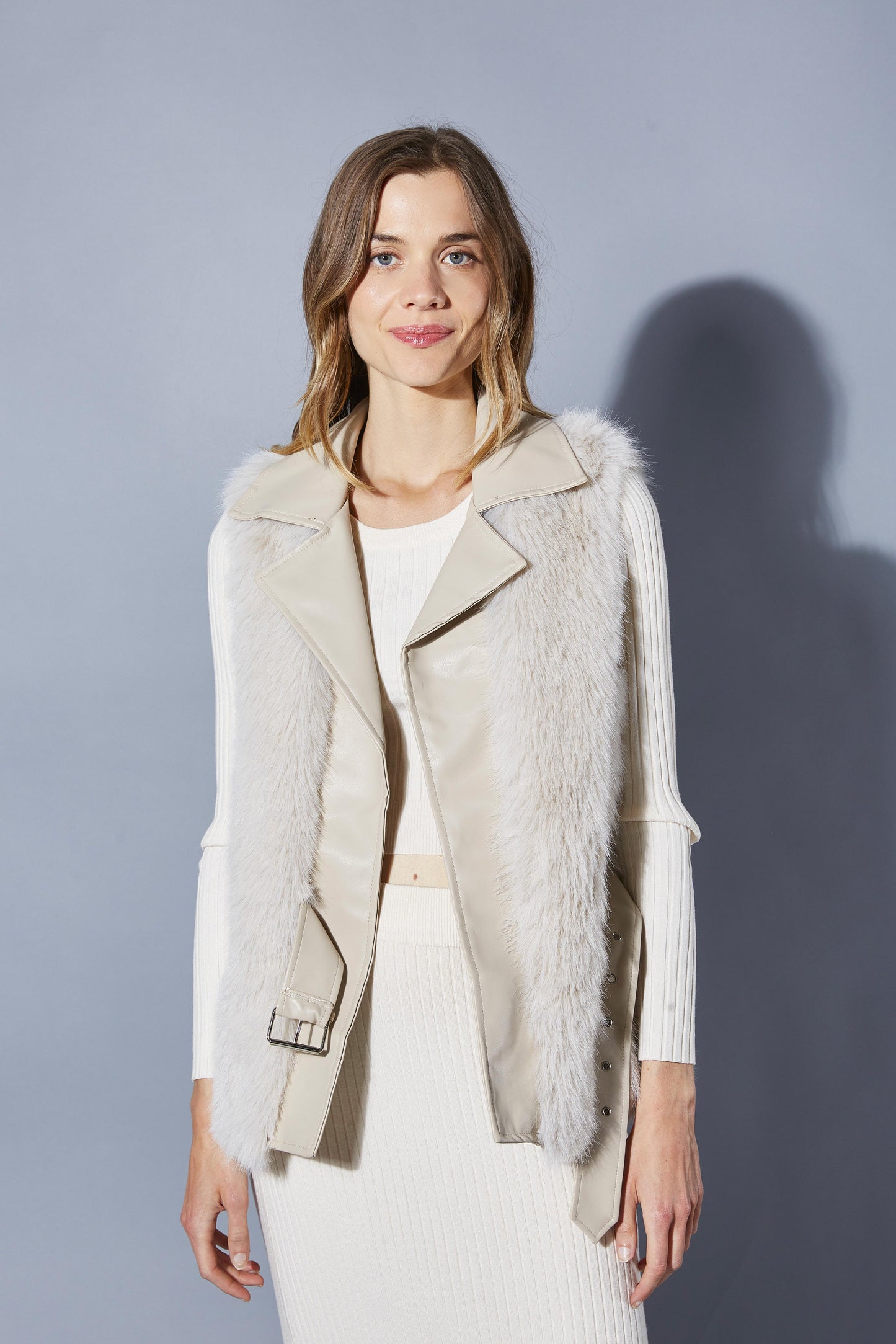 SLEEVELESS FAUX LEATHER JACKET WITH FUR