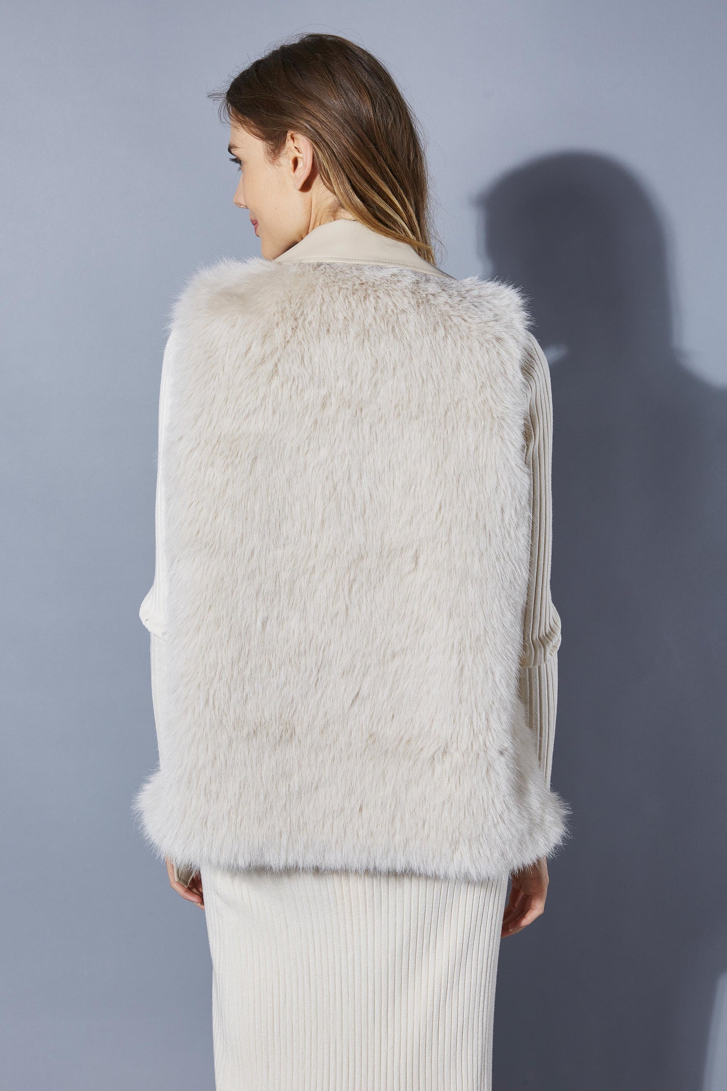 SLEEVELESS FAUX LEATHER JACKET WITH FUR