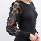 KNIT DRESS WITH PATTERNED SLEEVES