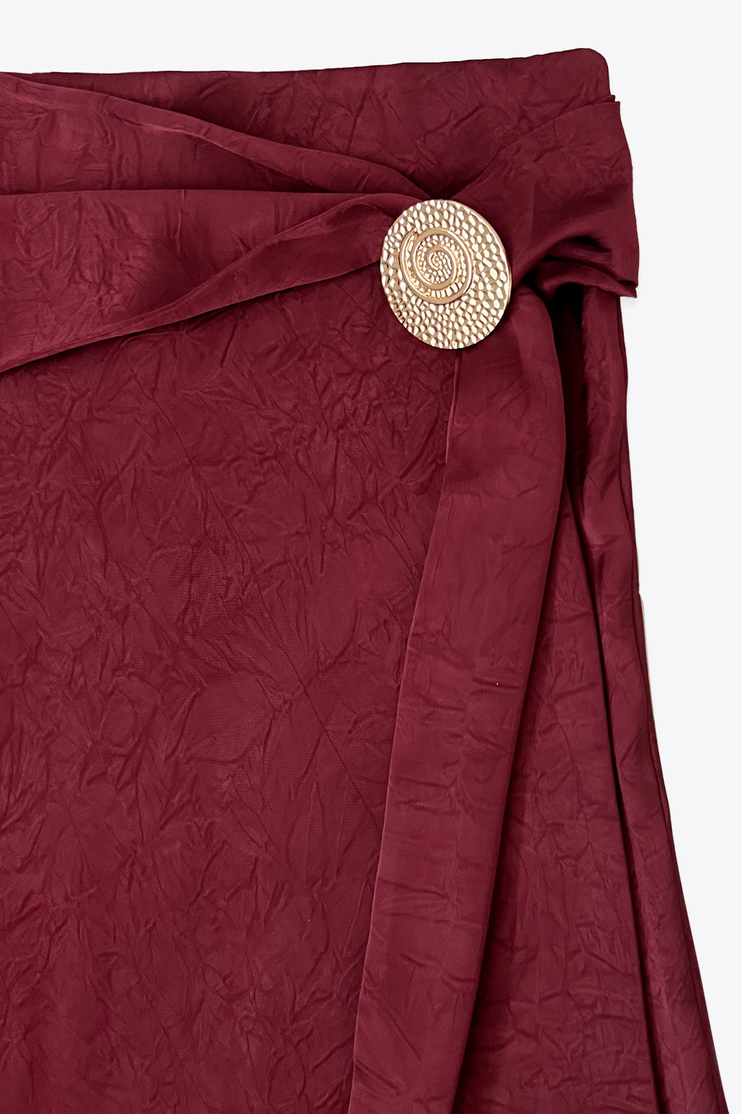 JUPE ÉVASÉE À BOUTONS DORÉS