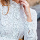 CHEMISE À POIS BLANCS