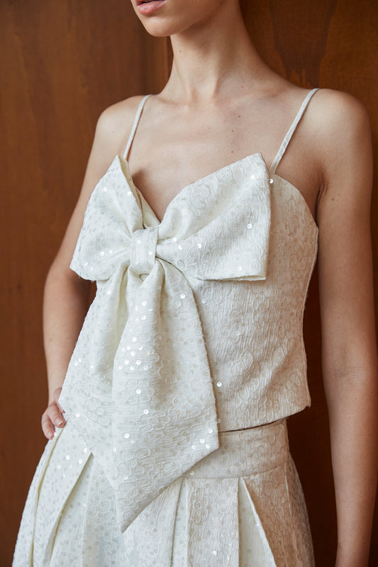 TIE-STRAP TOP WITH ALL-OVER BOW DETAIL