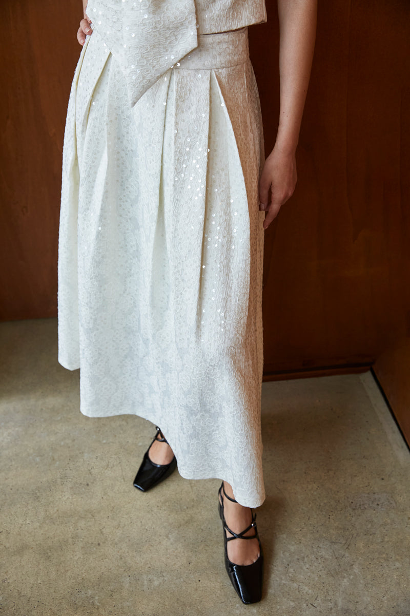 JUPE ÉVASÉE À SEQUINS