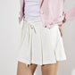 PLEATED SHORT SKIRT